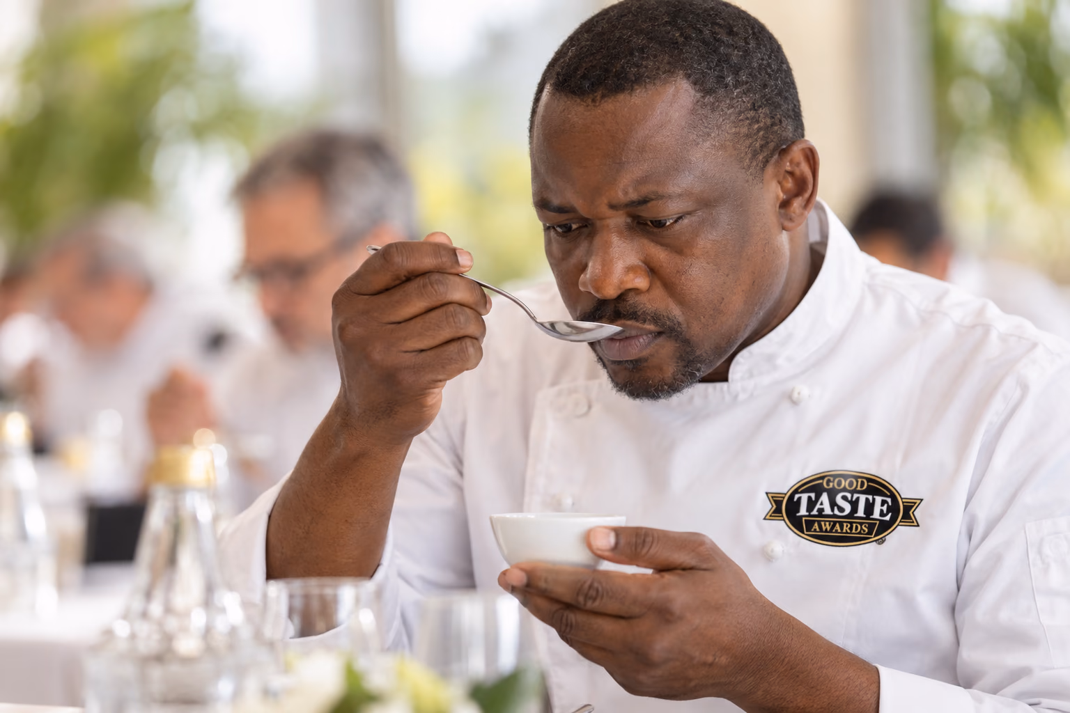 An assessor tasting a numbered product sample independently