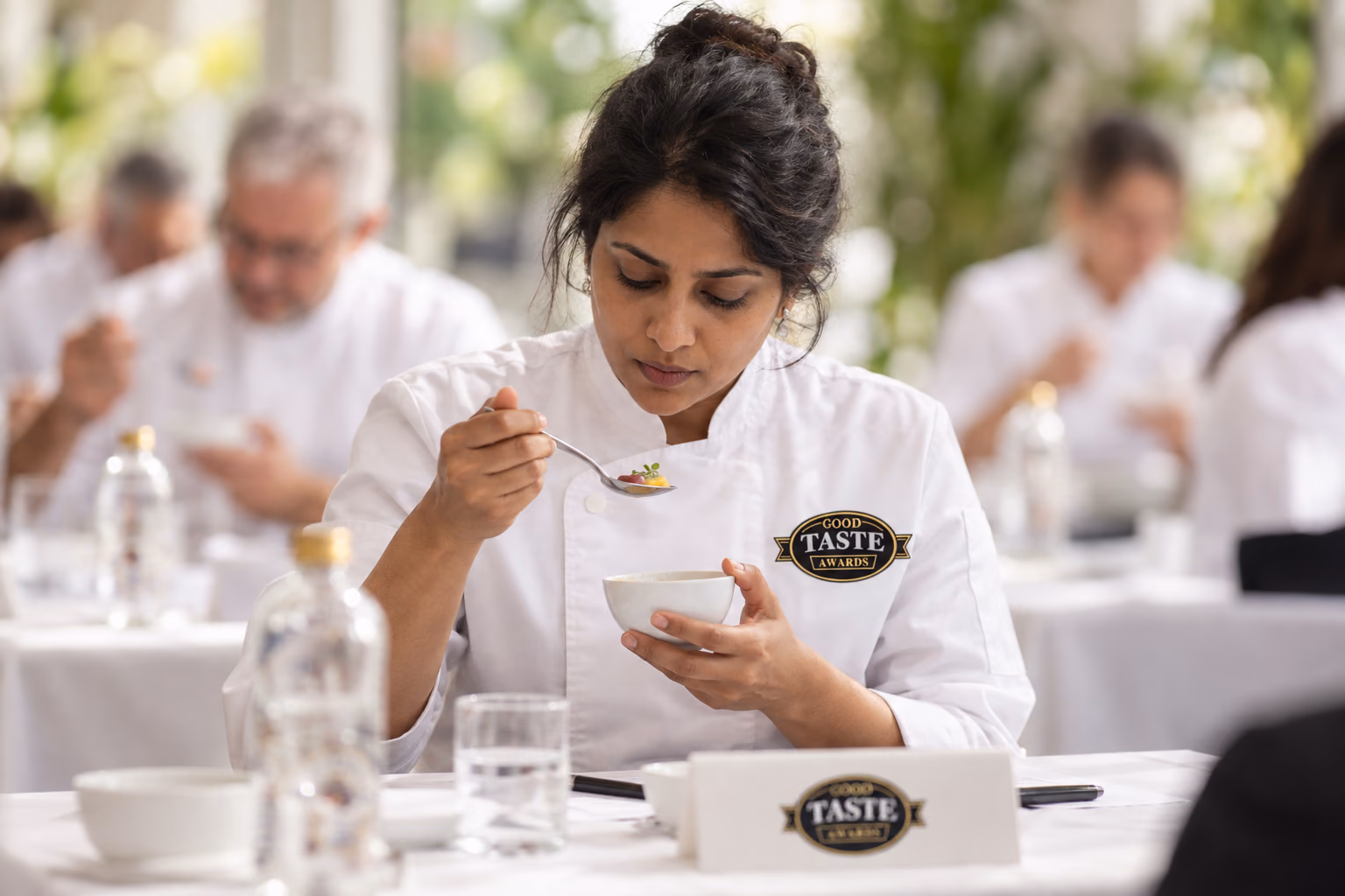 An assessor considering the flavour and finish of a product
